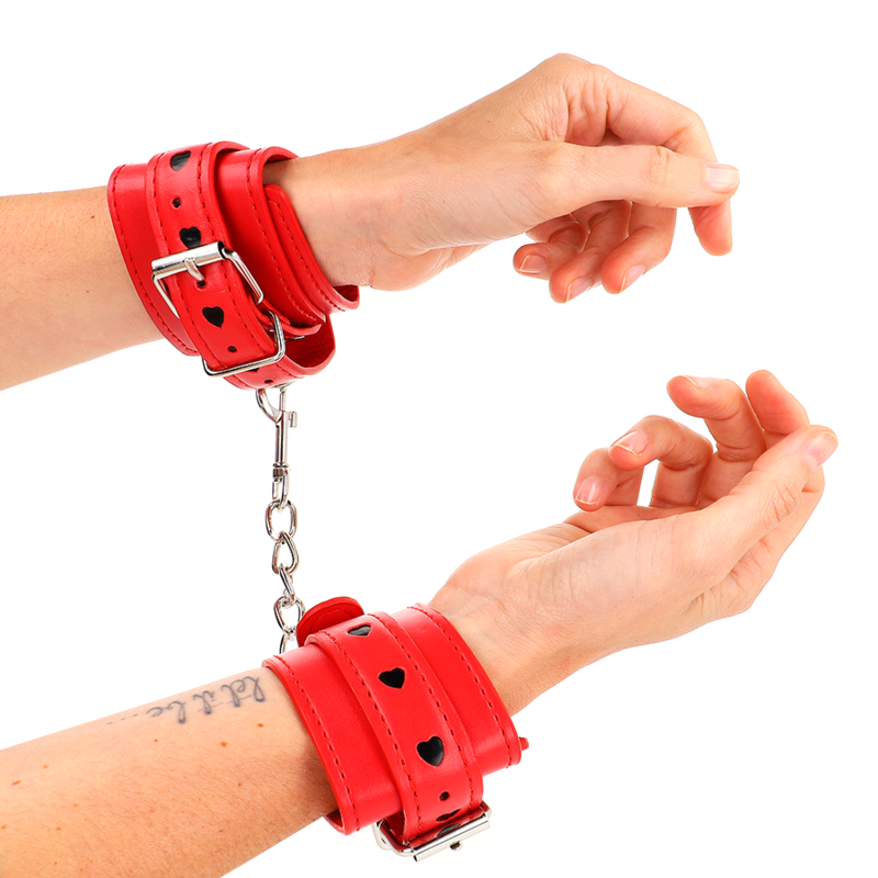 KINK - ROTE HANDGELENKFESSELN MIT SCHWARZEM HERZ-INLAY VERSTELLBAR 21-28 CM X 5,5 CM