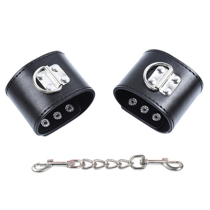 OHMAMA FETISH - HANDGELENKFESSELN MIT DRUCKKNÖPFEN AUS METALL